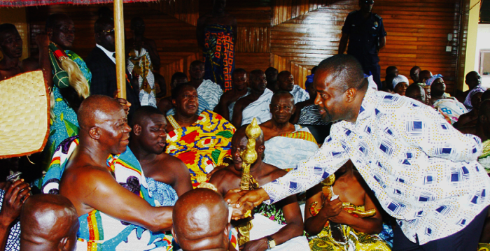 The President of 4 Garrison club, Mr Samuel Ampadu-Kyei (right), greeting Otumfuo Osei Tutu II at the Manhyia Palace